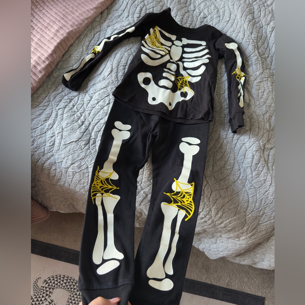 Glow in the dark skull pajamas. 4T